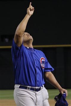 Carlos Zambrano points to the sky